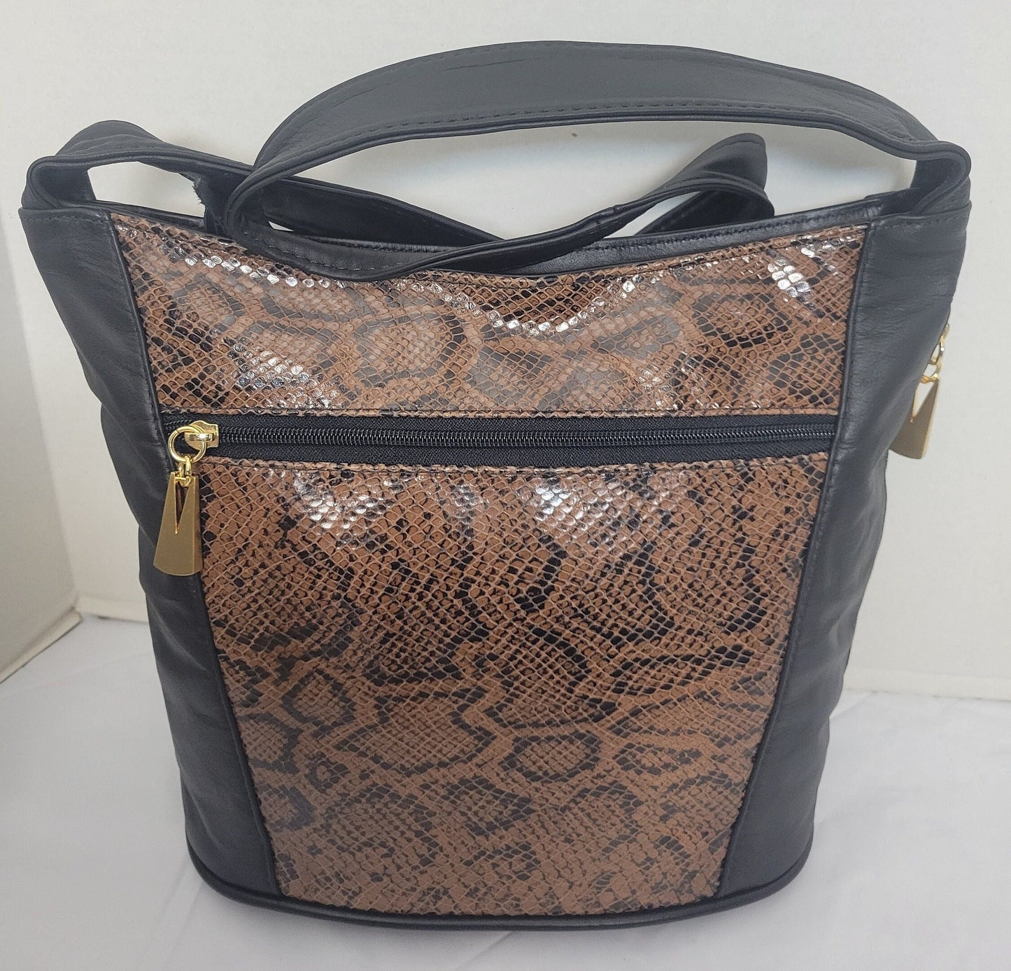 Tejrasila-Black with brown snake print genuine leather Shoulder handbag! Three outside pockets.Made in USA!