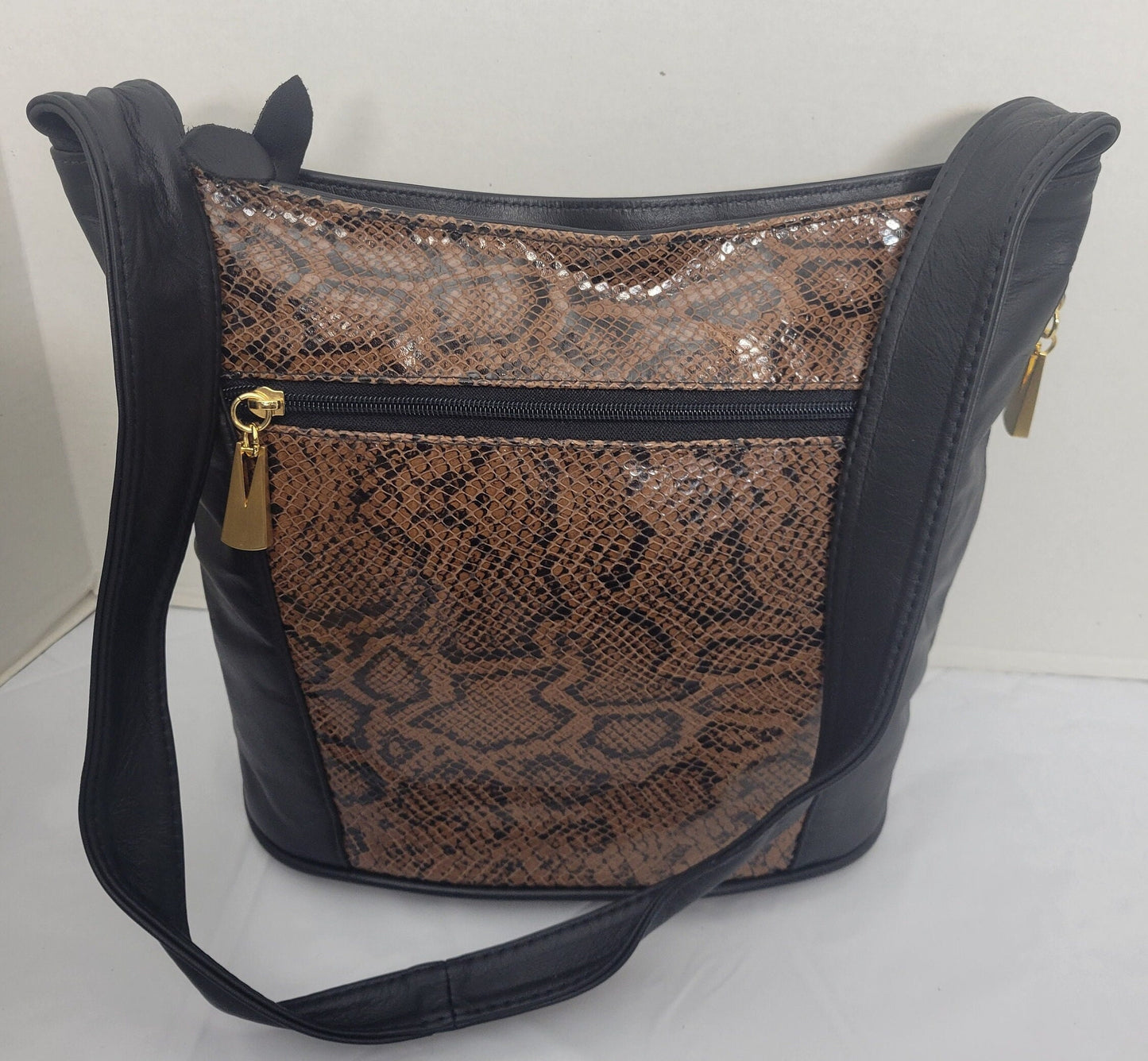 Tejrasila-Black with brown snake print genuine leather Shoulder handbag! Three outside pockets.Made in USA!