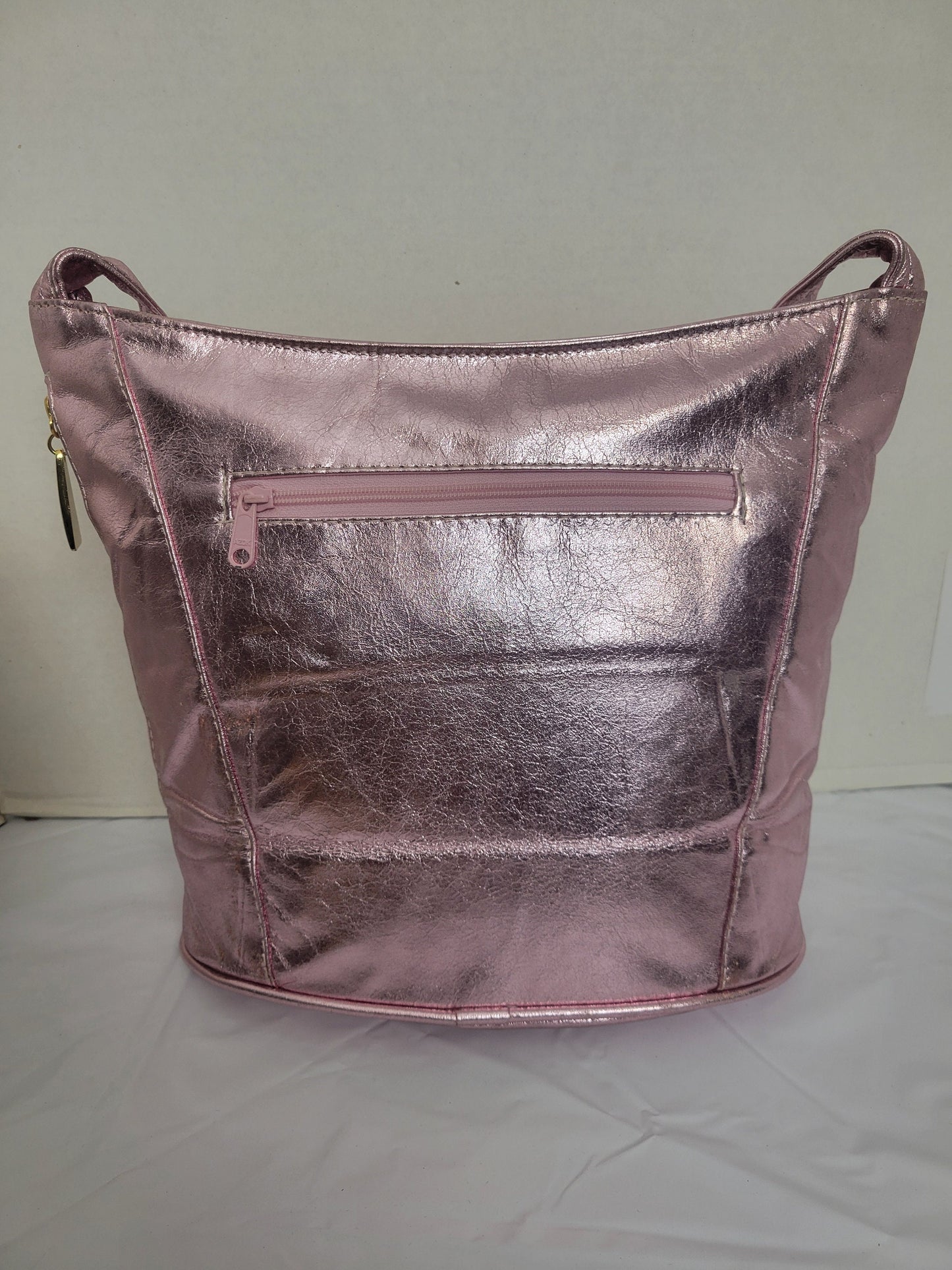 Tejrasila-Shining pink genuine leather, gold matel coin design Shoulder handbag! Three outside pockets.Made in USA!