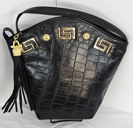 Black Leather Handbag: Embossed Print, Gold Accents & Tassel