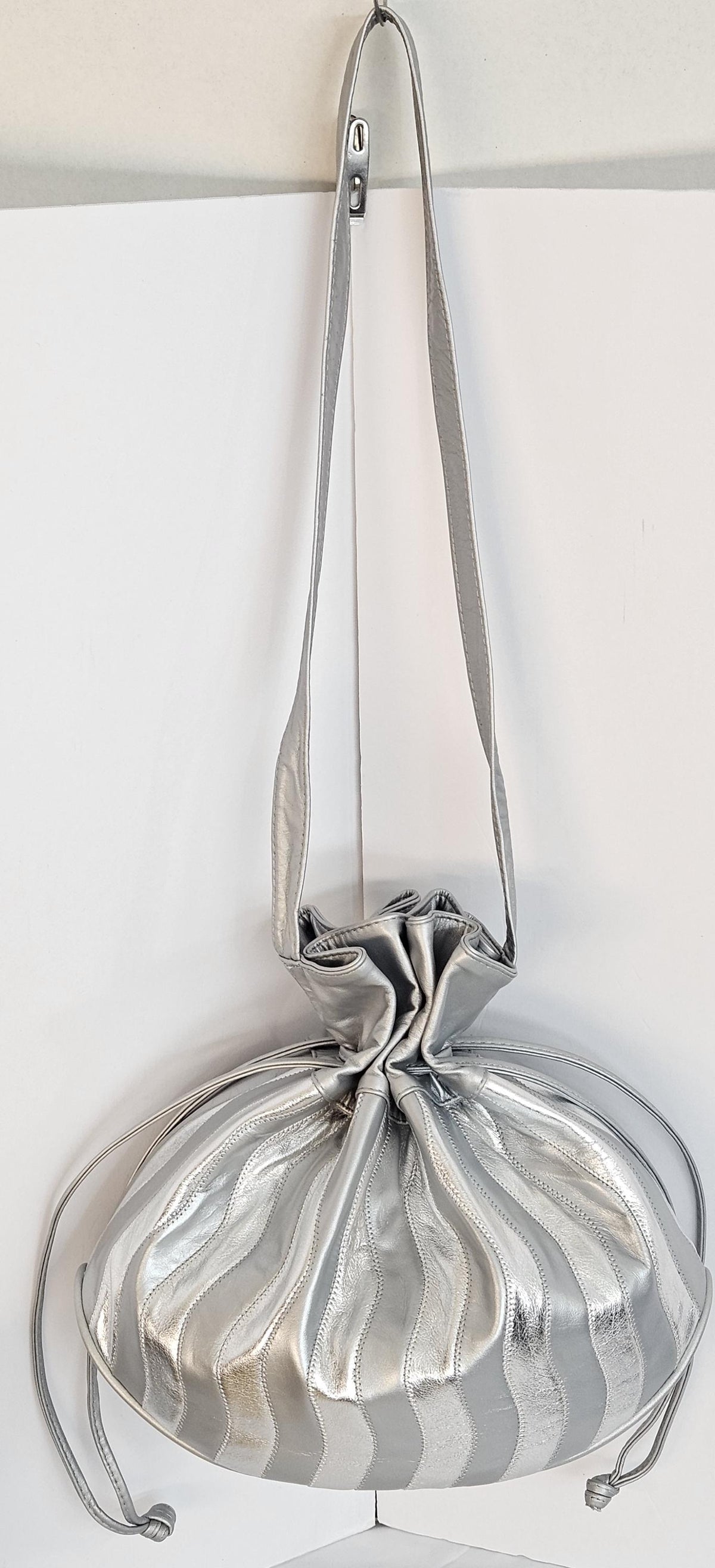 Silver Genuine Leather Drawstring Shoulder Bag: Zigzag Design