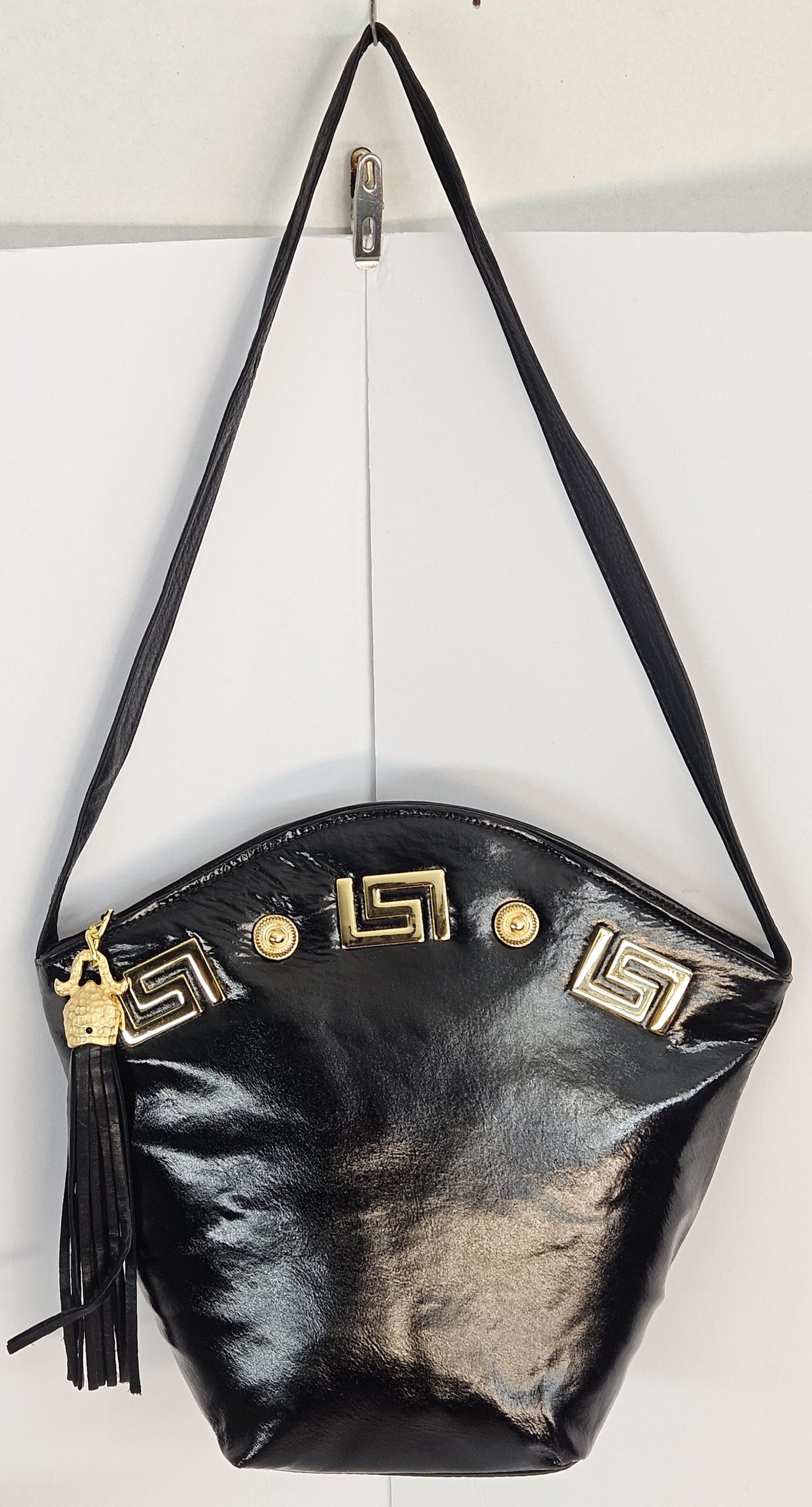 Black Genuine Leather Handbag: Gold Accents & Tassel