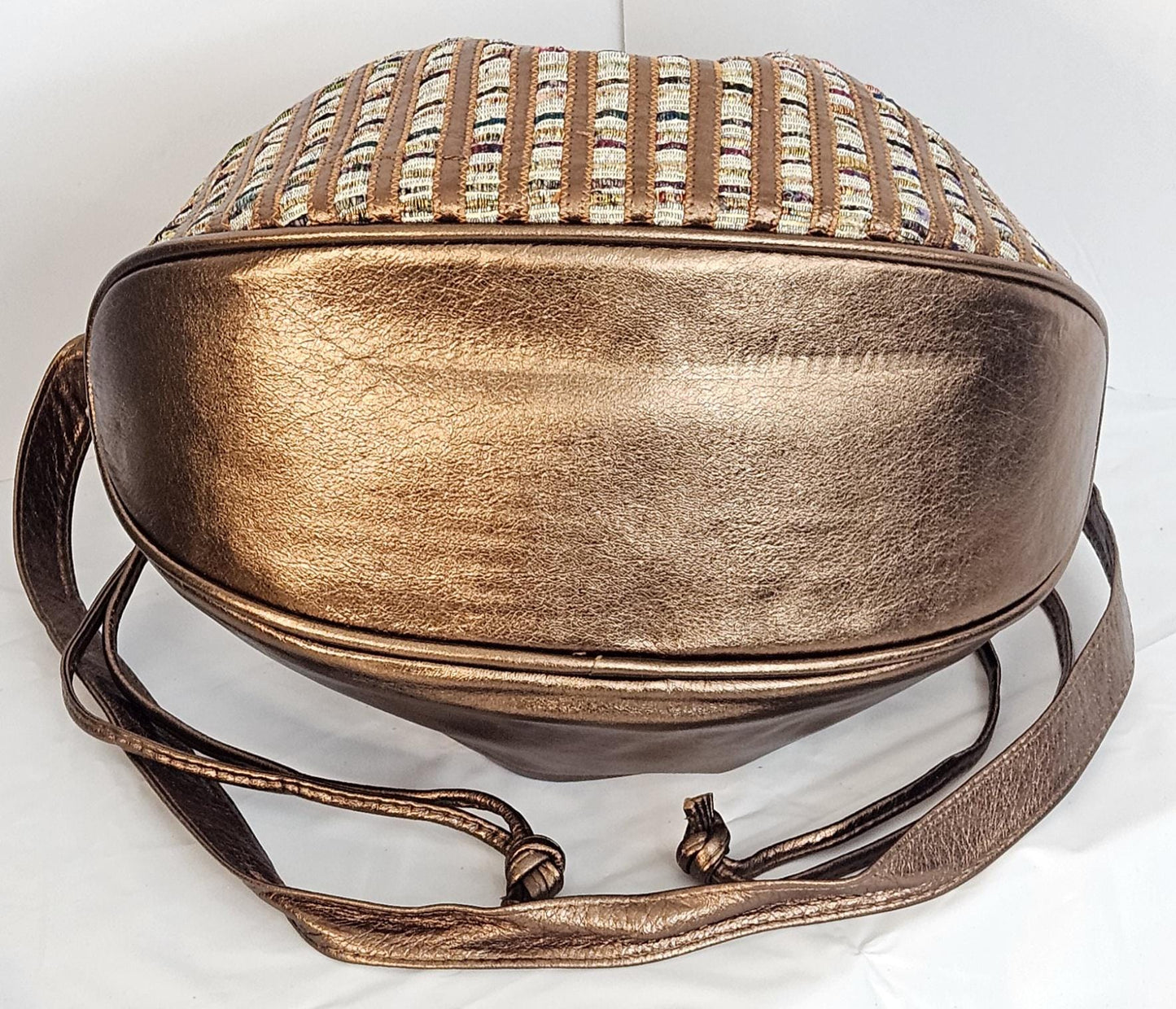 Bronze shinning Genuine Leather with  fabric zigzags stripes design. Item TR2031Bs-zig.Close with Drowsting Shoulders.Made in USA.