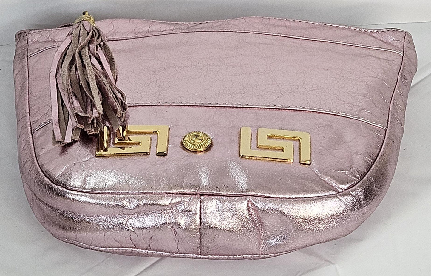 Pink metallic with Gold Z and Butten metal design on Leather Handbag. Item#Tr2030Pinkgz.Design for you.Made In USA!