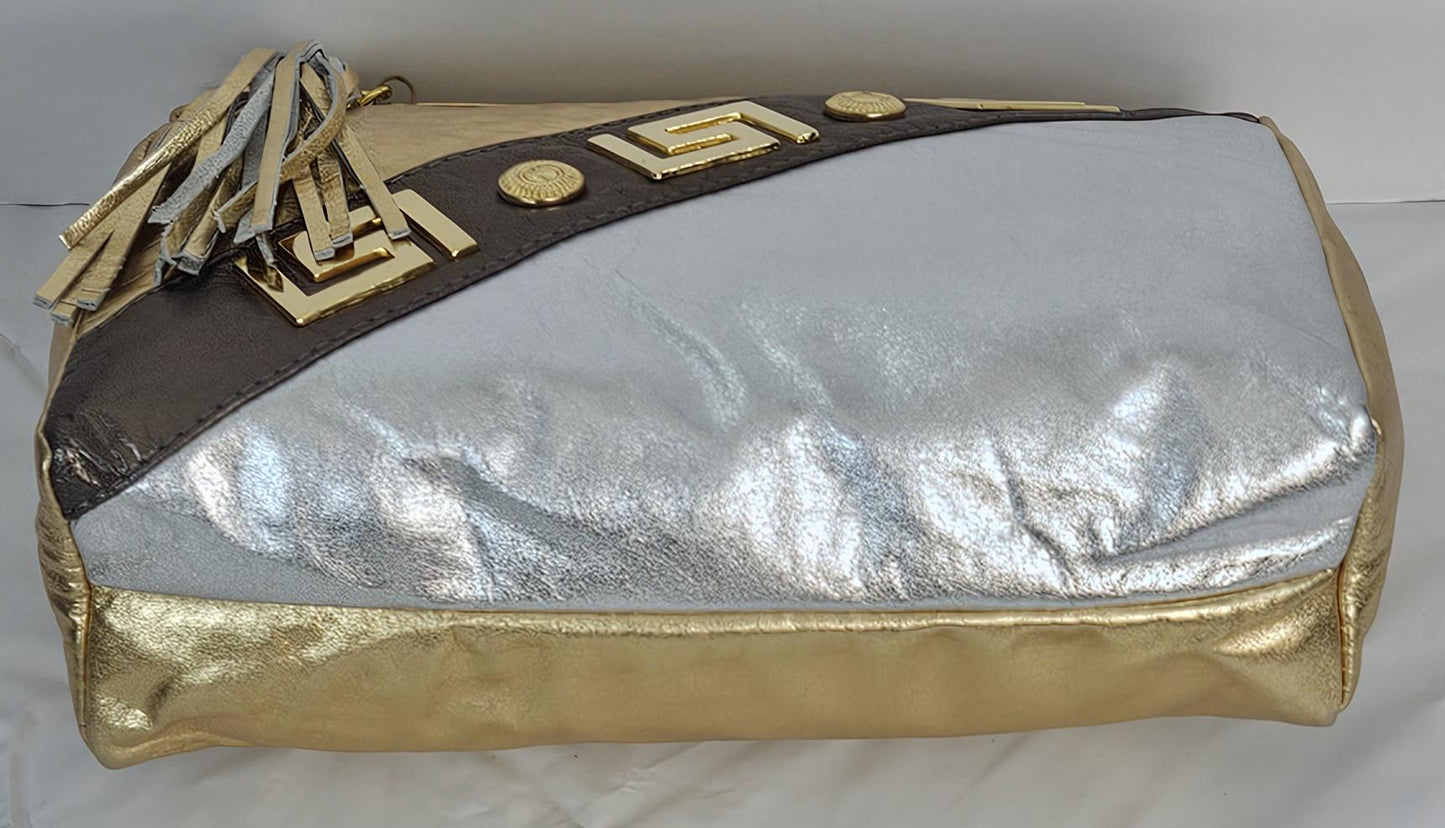 Gold,Silver,and pewter metallic design with gold matel Z&buttons. Genuine Leather Handbag #TR3018GSP-gzb.Made in USA.