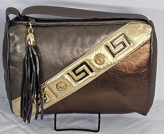 Pewter,bronze,and gold metallic design with gold matel Z&buttons. Genuine Leather Handbag #TR3018PBG-gzb-1.Made in USA.
